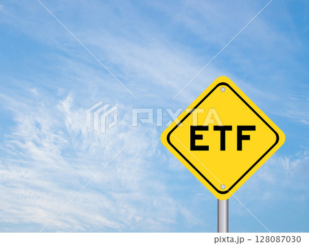 Yellow transportation sign with word ETF (abbreviation of Exchange Traded Fund) on blue color sky background Yellow transportation sign with word ETF (abbreviation of Exchange Traded Fund) on blue color sky background 128087030