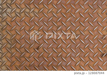 Stain and rust non-slip metal background with copy space. This texture can use for effect layer 128087044