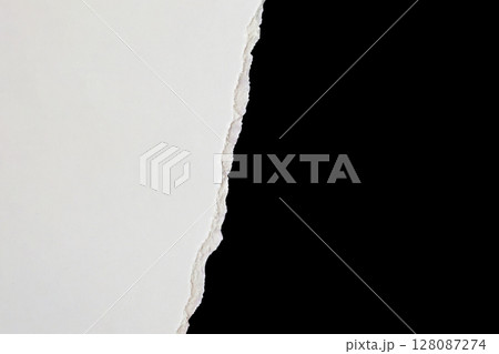 White ripped paper torn edges strips isolated on black background White ripped paper torn edges strips isolated on black background 128087274