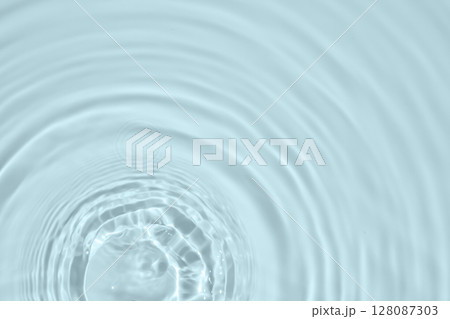 Abstract transparent water shadow surface texture natural ripple on blue background Abstract transparent water shadow surface texture natural ripple on blue background 128087303
