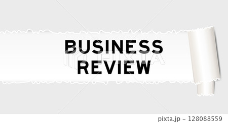 Ripped gray paper background that have word business review under torn part 128088559