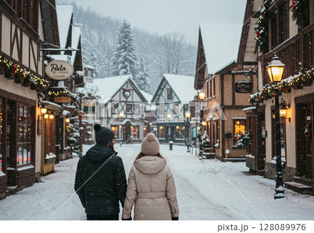 Couple walking on a snow covered street 128089976