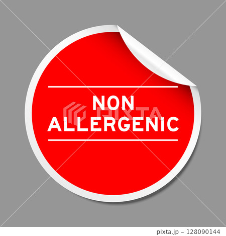 Red color peel sticker label with word non allergenic on gray background Red color peel sticker label with word non allergenic on gray background 128090144