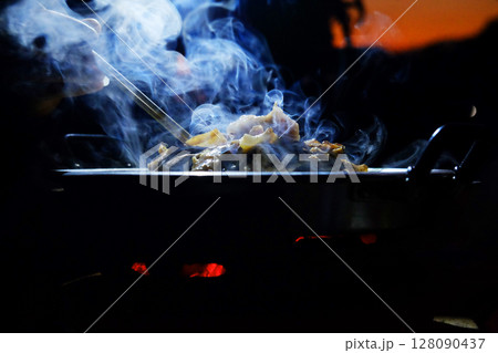 beautiful smoke of Thai BBQ buffet or Thai-style Barbecue in dark night beautiful smoke of Thai BBQ buffet or Thai-style Barbecue in dark night 128090437