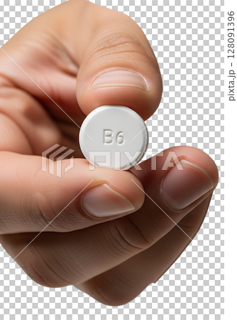 Hand holding single vitamin b6 pill, health supplement isolated on transparent background, nutrition, wellness, dietary aid, pyridoxine for metabolism 128091396