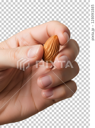 Hand holding single almond nut, healthy snack concept, isolated on transparent background, natural food, nutrition and diet 128091885