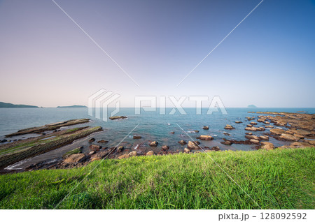 Scenic Coastline of Shimen New Taipei City with Keelung Islet View. 128092592