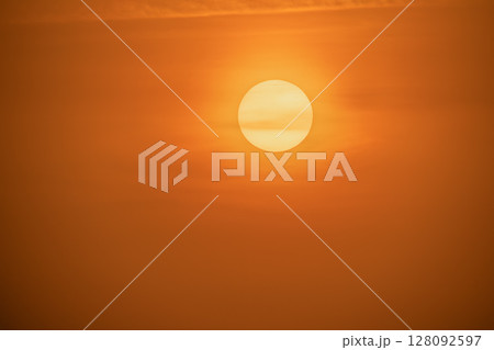Sunset Silhouette of the Sun over the Sea in Shimen, Taiwan. 128092597