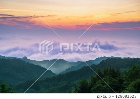 Misty Morning Over Shilin New Taipei Taiwan with Taipei City Silhouette. Misty Morning Over Shilin New Taipei Taiwan with Taipei City Silhouette. 128092625