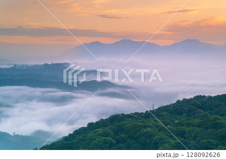 Morning Fog Over Shulin Mountains with Power Towers New Taipei City Taiwan. 128092626