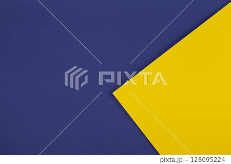 Paper blue background with yellow triangle. Colored paper geometric shapes with blue and yellow tones. Paper blue background with yellow triangle. Colored paper geometric shapes with blue and yellow tones. 128095224