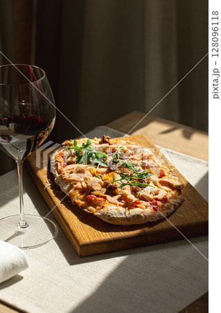 Pinsa with turkey porcini mushrooms and cheese Pinsa with turkey porcini mushrooms and cheese 128096118