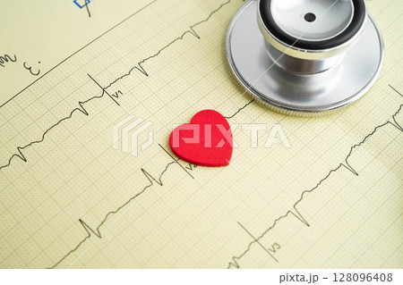 Stethoscope on electrocardiogram ECG, heart wave, heart attack, cardiogram report. 128096408