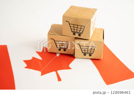 Online shopping, Shopping cart box on Canada flag, import export, finance commerce. 128096461