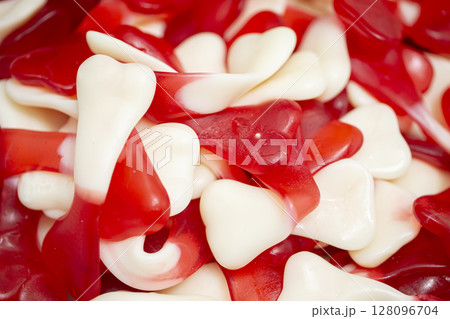 Sweets background. Bright gummy candies close-up. Close-up of colorful jujube background pattern Sweets background. Bright gummy candies close-up. Close-up of colorful jujube background pattern 128096704