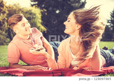 Couple on picnic date outdoor. Couple on picnic date outdoor. 128097865
