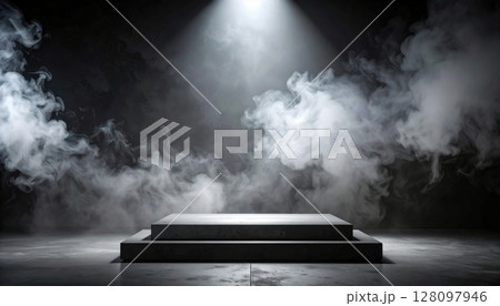 Dark night mist surrounds an old book with wisps of smoke on a table 128097946