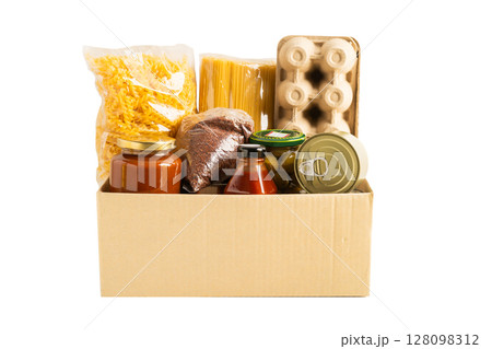 Foodstuffs in donation box isolated on white background with clipping path for volunteer to help people. Foodstuffs in donation box isolated on white background with clipping path for volunteer to help people. 128098312