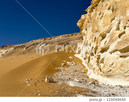White rock formations and sand dunes in Egypt's White Desert, natural desert landscape	 128098680