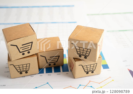 Online shopping, Shopping cart box on business graph, import export, finance commerce. 128098789