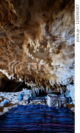 Djara Cave in Egypt with impressive stalagmites and natural rock formations. A hidden geological wonder in the heart of the Sahara desert	 128099167
