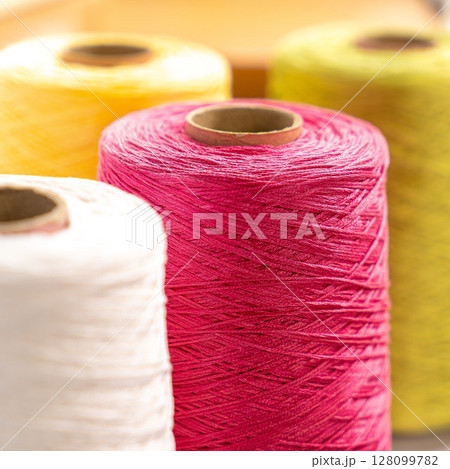 Threads in reels. Colored bobbins for embroidery knitting hobby accessories creativity. 128099782