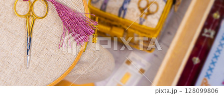 Accessories for hobby. Hoop snaps, scissors, threads, needles and scissors. Vintage tools for embroidery and knitting Accessories for hobby. Hoop snaps, scissors, threads, needles and scissors. Vintage tools for embroidery and knitting 128099806