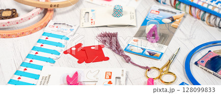 Accessories for hobbies. Needles, threads, hoops snaps, marker, stick for knitting and embroidery 128099833