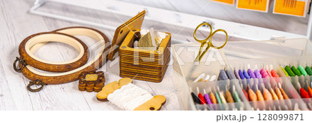 Accessories for hobby. Hoop snaps, threads, needles and scissors. Vintage tools for embroidery and knitting Accessories for hobby. Hoop snaps, threads, needles and scissors. Vintage tools for embroidery and knitting 128099871
