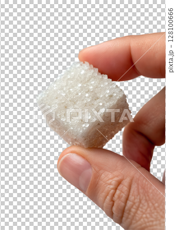 Sugar cube held between fingers against transparent background, sweetener concept, coffee or tea additive, white refined sugar Sugar cube held between fingers against transparent background, sweetener concept, coffee or tea additive, white refined sugar 128100666