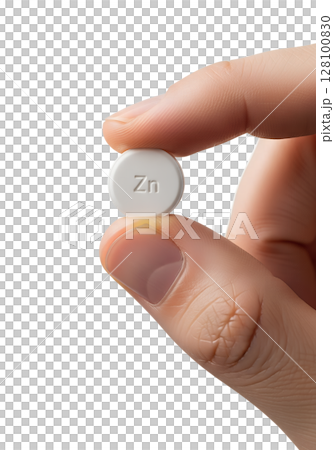 Close-up of hand holding zinc tablet, immunity booster, isolated on transparent background, dietary supplement, mineral nutrition, wellness concept Close-up of hand holding zinc tablet, immunity booster, isolated on transparent background, dietary supplement, mineral nutrition, wellness concept 128100830