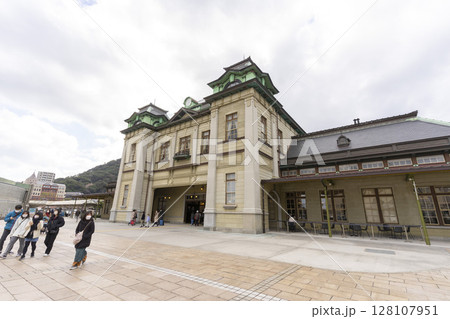 Kitakyushu, Japan - Dec 29,2022 : The old Mojiko station building with blue sky in Kitakyushu, Japan on Dec 29,2022. 128107951