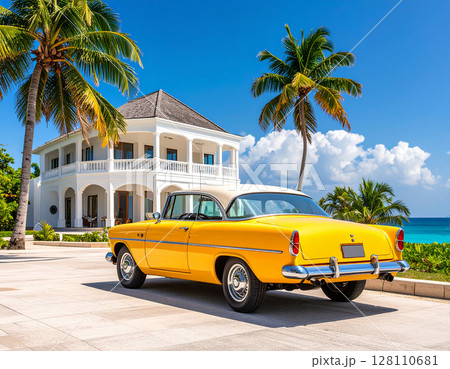 海沿いの高級リゾートホテルと黄色いクラシックカー 128110681