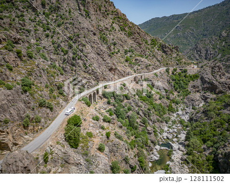 Camping Caravan driving through Canyon de la Ruda road Corsica down the pass monte Cino 128111502