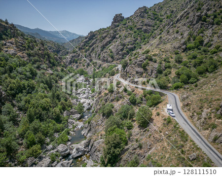 Camping Caravan driving through Canyon de la Ruda road Corsica down the pass monte Cino 128111510