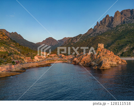 Aerial view town ruins Genoese tower of Porto Corsica France medieval watchtower Mediterranean Sea Calanches de Piana Aerial view town ruins Genoese tower of Porto Corsica France medieval watchtower Mediterranean Sea Calanches de Piana 128111518