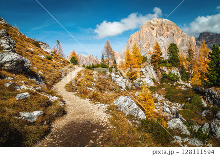 Spectacular hiking trail on the slope at autumn, Dolomites, Italy Spectacular hiking trail on the slope at autumn, Dolomites, Italy 128111594