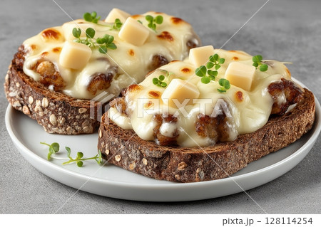 Avocado cheese and whole wheat rye bread come together to create healthy toasts, served alongside mouthwatering snacks and avocado sandwiches, illustrating the diversity of vegetarian food and vegan 128114254