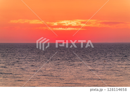 Beautiful red and orange sunrise over the sea. 128114658