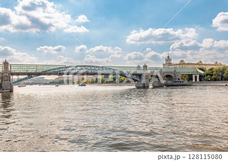 View of the Moscow river embankment, Pushkinsky bridge and cruise ships at sunset. 128115080