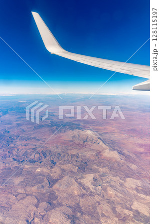 Aerial view on arabian desert and Red sea mountains from airplane 128115197