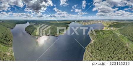 Big lake with green shores in bright sun light, aerial landscape. Recreation concept. Aerial view 128115216