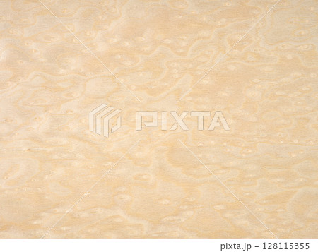 Whimsical patterns of creamy vanilla and soft alabaster swirl in the unique burl of this maple veneer 128115355