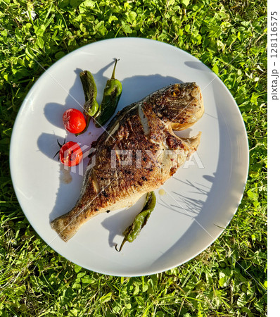 freshly grilled dorada freshly grilled dorada 128116575