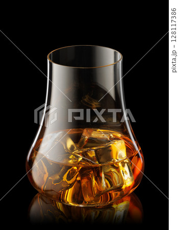 Glass of scotch whiskey and ice isolated on black background with clipping path Glass of scotch whiskey and ice isolated on black background with clipping path 128117386