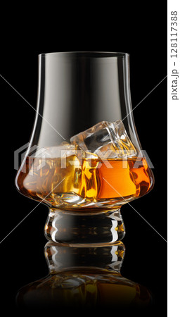 Glass of scotch whiskey and ice isolated on black background with clipping path Glass of scotch whiskey and ice isolated on black background with clipping path 128117388