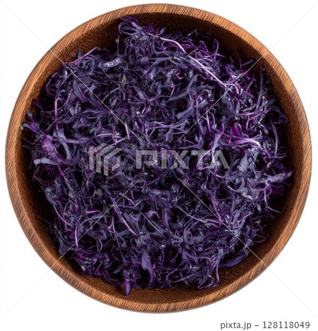 In the wooden bowl are red cabbage sprouts, with their leaves and cotyledons belonging to the Brassica oleracea family, which includes purple cabbage, red or blue kraut, categorized as a vegetable 128118049