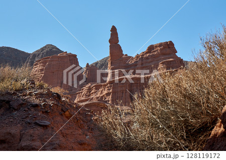 Red rock formations, canyon landscape with clear blue sky. 128119172