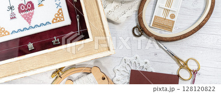 Accessories for hobby. Hoop snaps, scissors, threads, needles and scissors. Vintage tools for embroidery and knitting Accessories for hobby. Hoop snaps, scissors, threads, needles and scissors. Vintage tools for embroidery and knitting 128120822