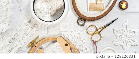 Accessories for hobby. Hoop snaps, scissors, threads, needles and scissors. Vintage tools for embroidery and knitting Accessories for hobby. Hoop snaps, scissors, threads, needles and scissors. Vintage tools for embroidery and knitting 128120831